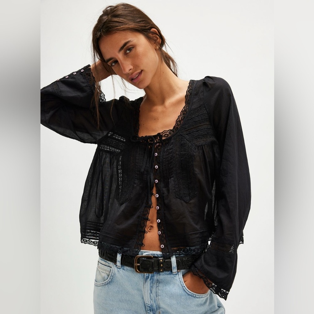 Free People Black blouse . Never worn . New with tags